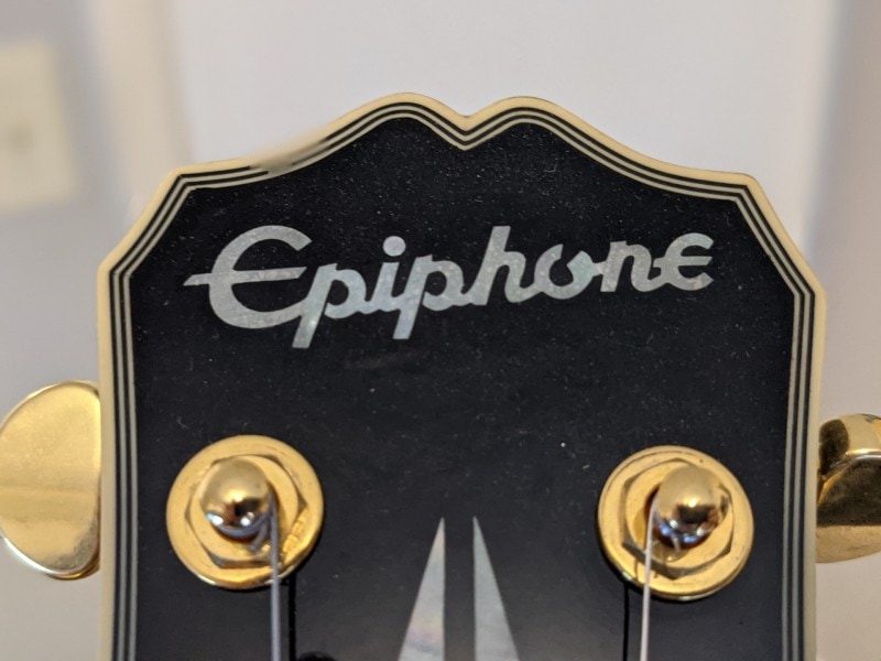 How To Spot A Fake Epiphone Les Paul - Headstock binding